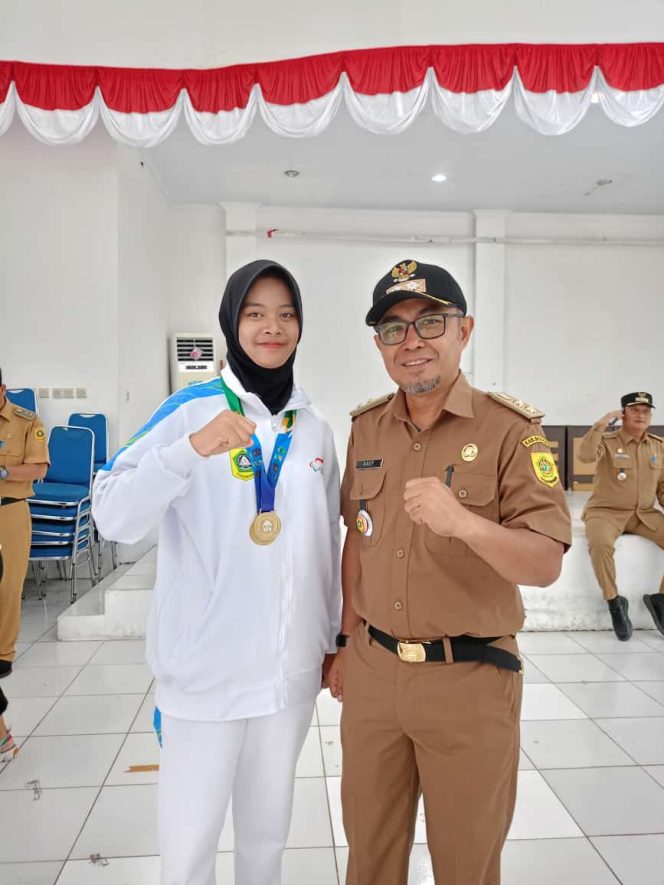 
					Harumkan Nama Kelurahan Harapanjaya sabet Medali Emas Piala Gubernur Jabar 2024, Asep Taryat Apresiasi Atlet SOD NPCI Kabupaten Bogor 