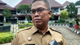 Kepala DPMD Kabupaten Bogor, Hadijana saat dimintai keterangan di kawasan Cibinong. (Foto: Erwin)